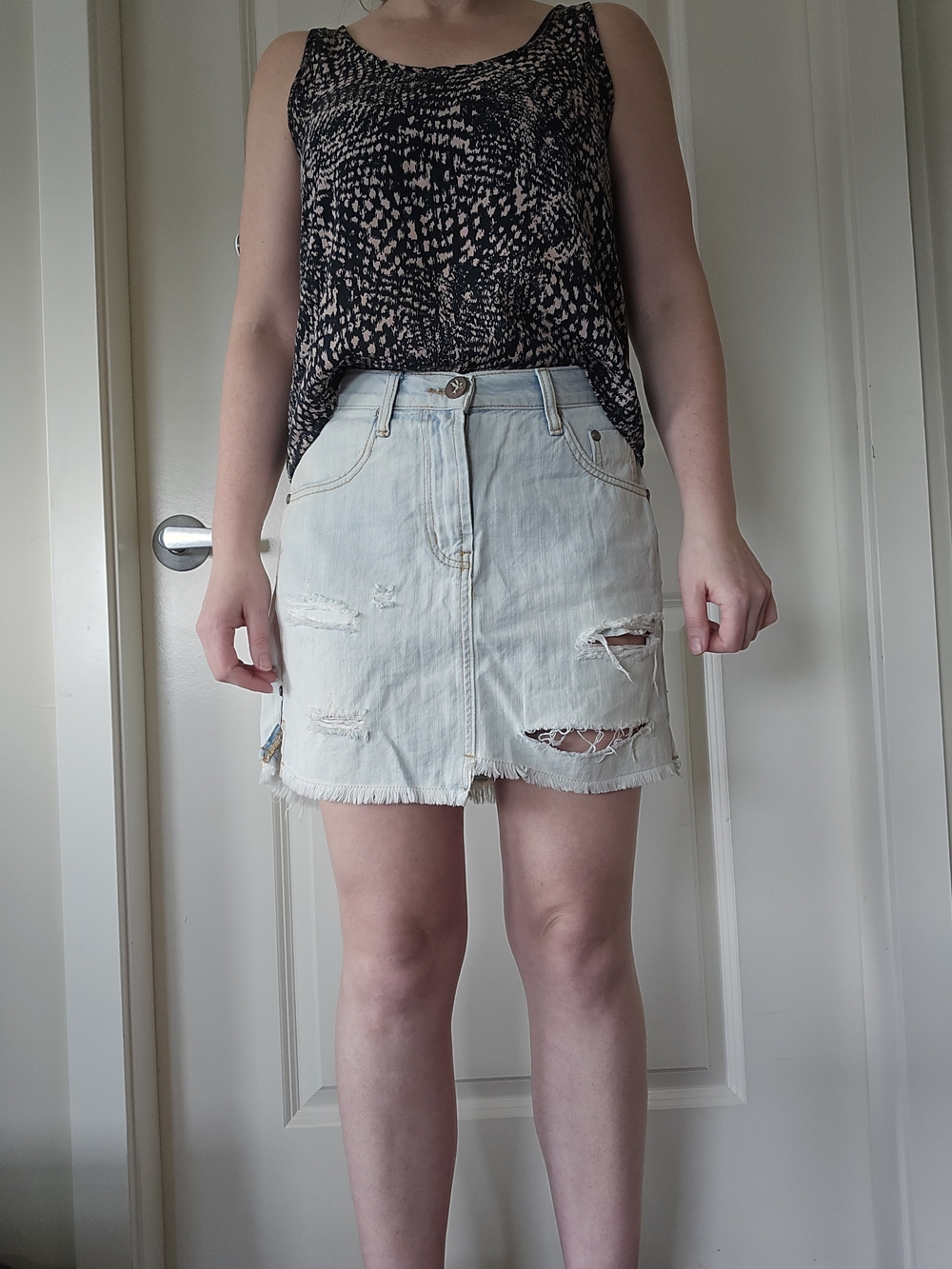 Light Wash Distressed Denim Mini Skirt